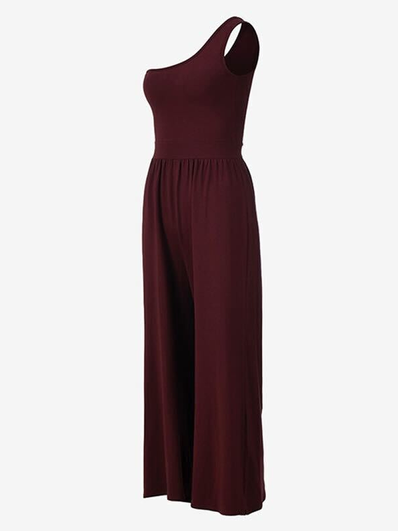 Damski kombinezon sportowy w bordowo-burgundowym odcieniu z asymetryczym dekoltem na jedno ramię – z dopasowaną górą i luźnym, szerokim dołem