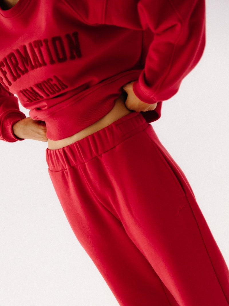 Czerwone bawełniane spodnie dresowe Evolve - widok na pas ze ściągaczem