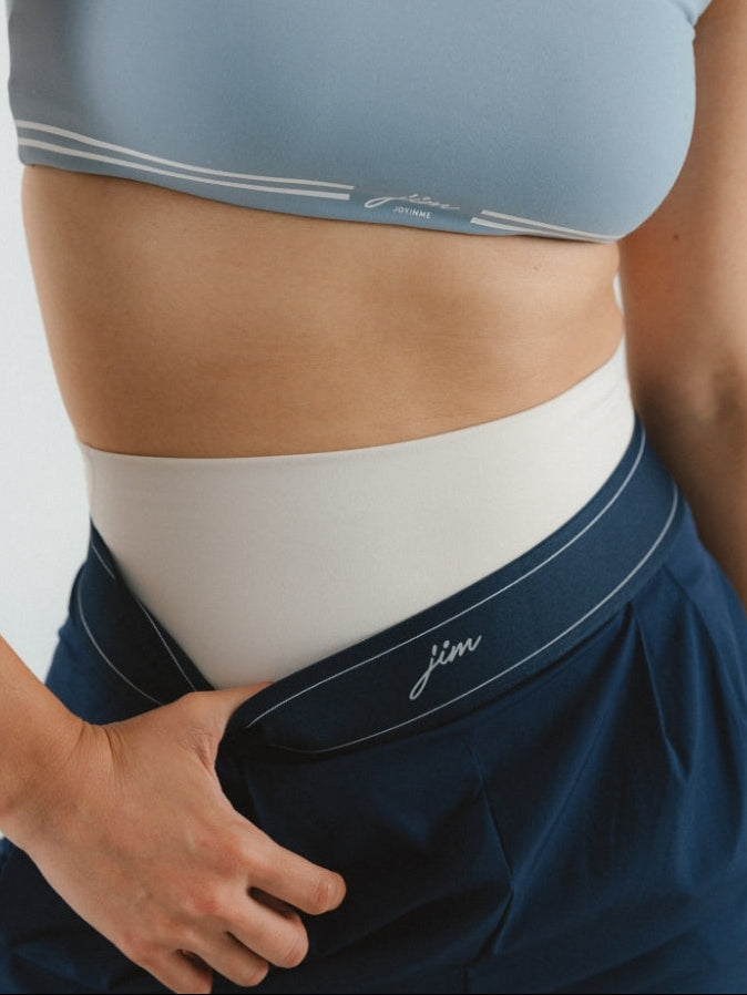 Granatowe damskie szerokie spodnie treningowe (wide leg) z elastycznym pasem i kieszeniami - set z błękitnym crop topem JOYINME
