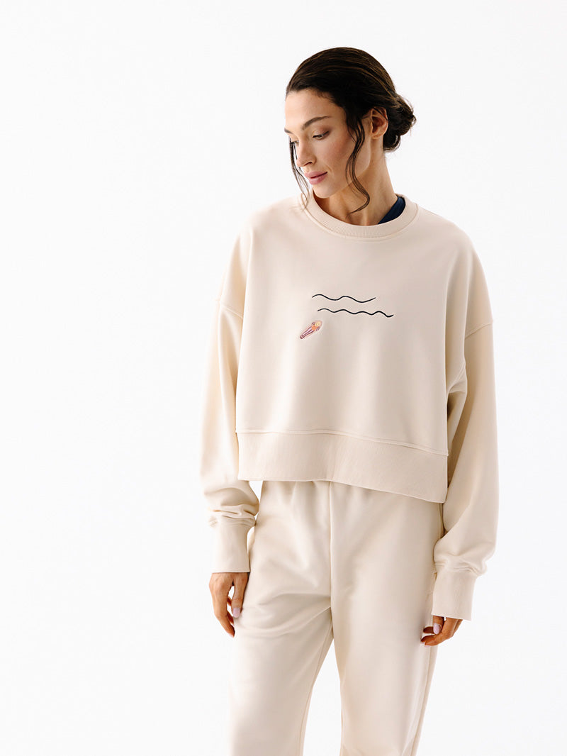 Kremowa luźna bluza damska z bawełny Wave