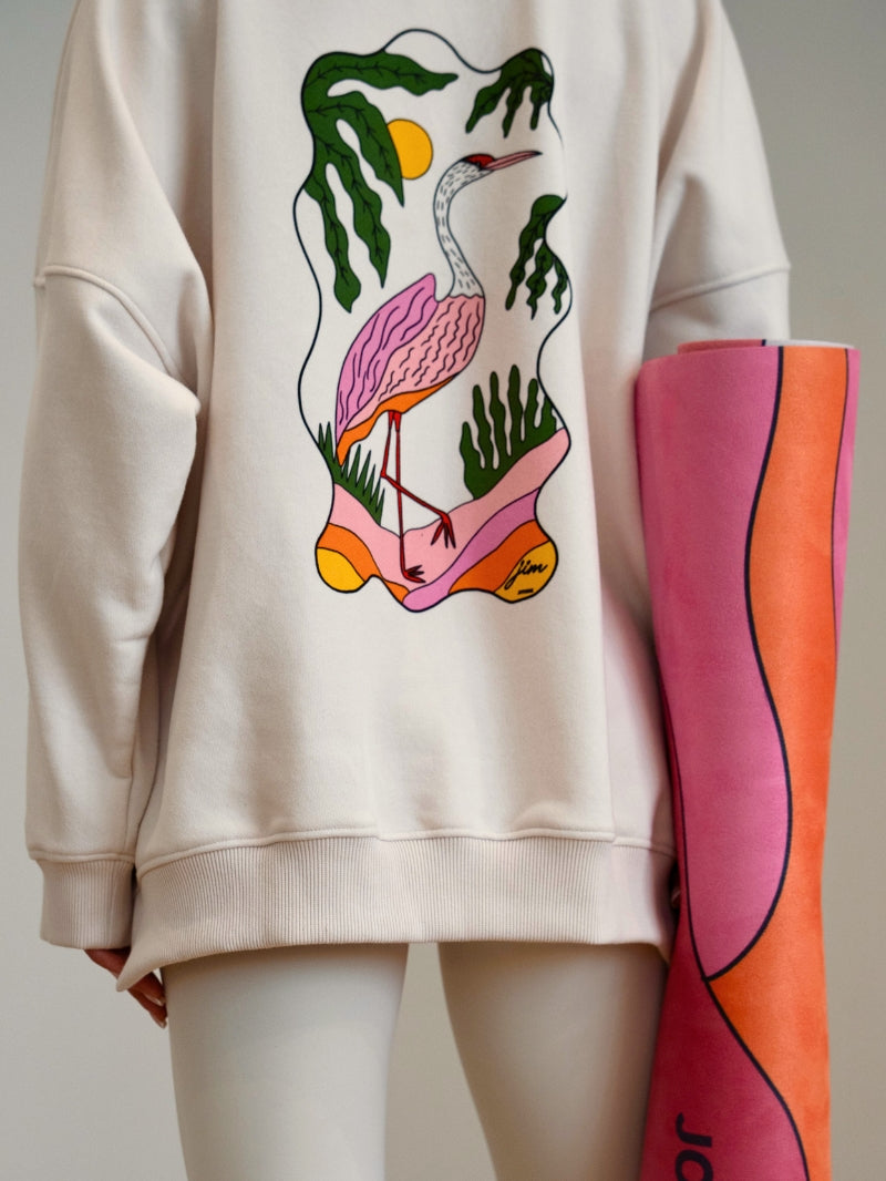 Kremowa luźna bluza bawełniana z grafiką czapli - JOYINME x Ewa Konstantynowicz Goss