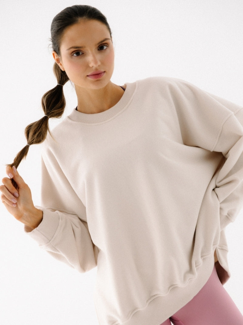 Luźna bawełniana bluza oversize w kremowym kolorze z serii KIND