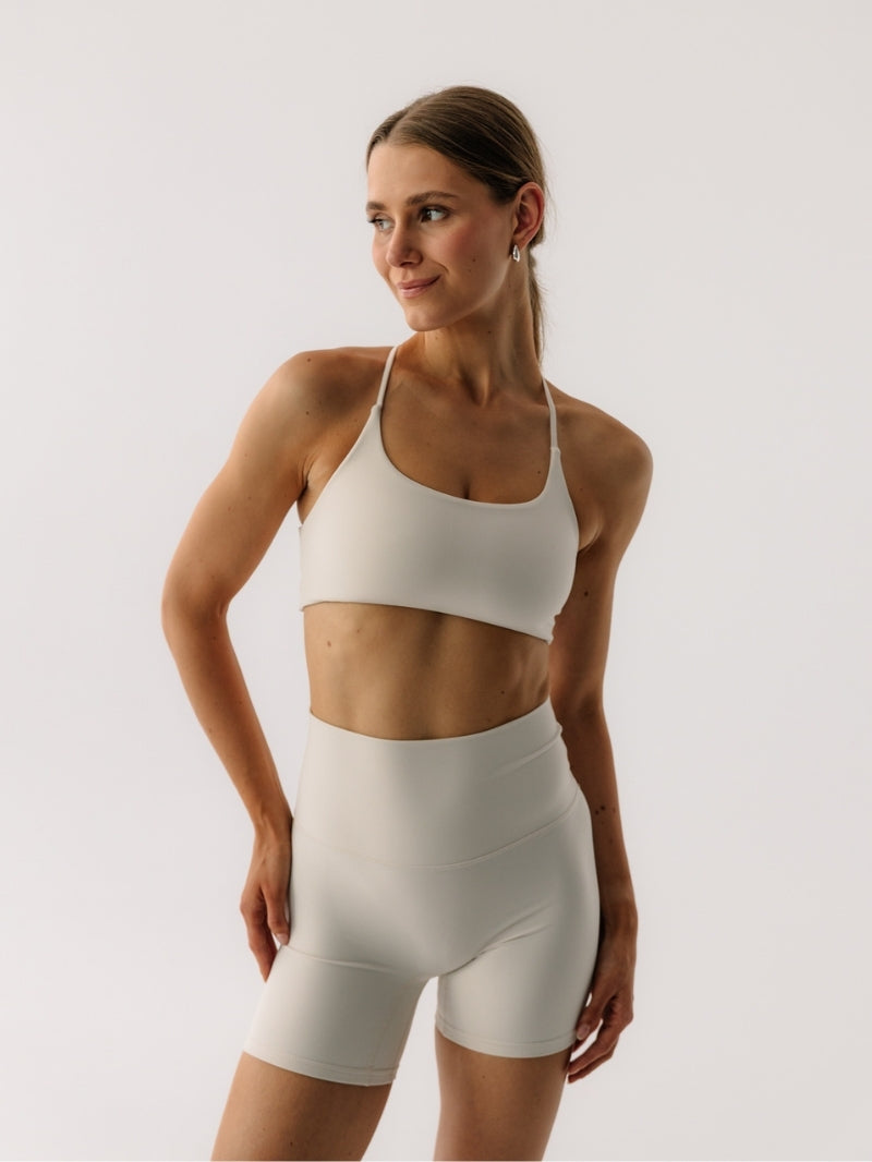 Kremowe damskie spodenki sportowe JOYINME - set z kremowym crop topem