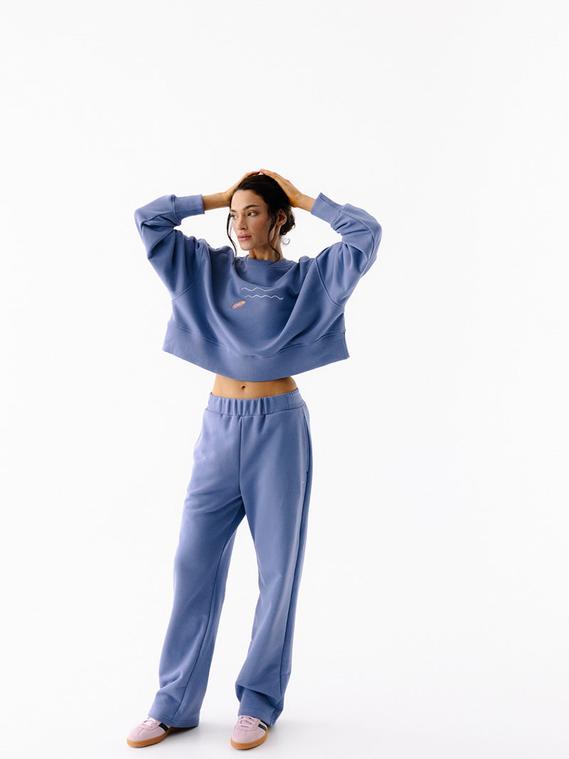 Niebieska luźna bluza damska z bawełny Wave - widok na szerokość w talii