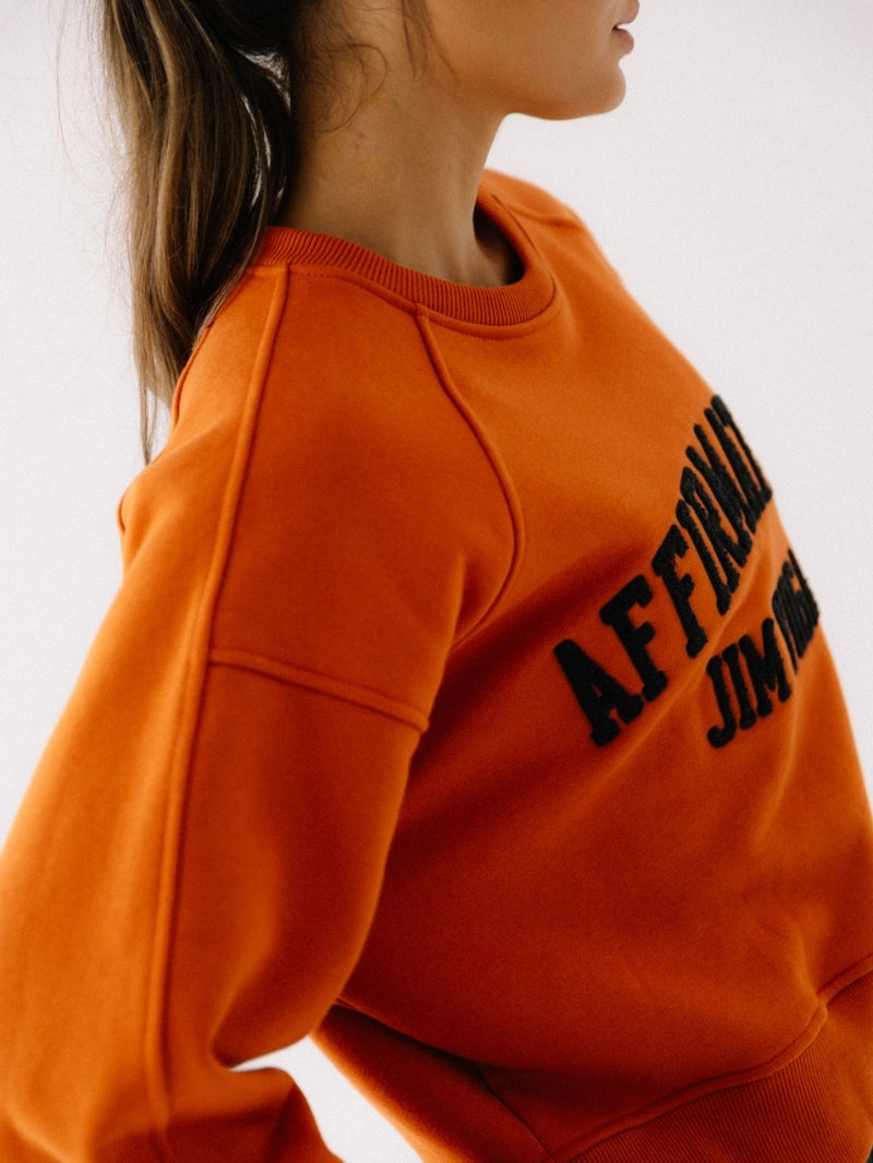 Szeroka, pomarańczowa bluza oversize z serii Classic z haftem o skróconym fasonie