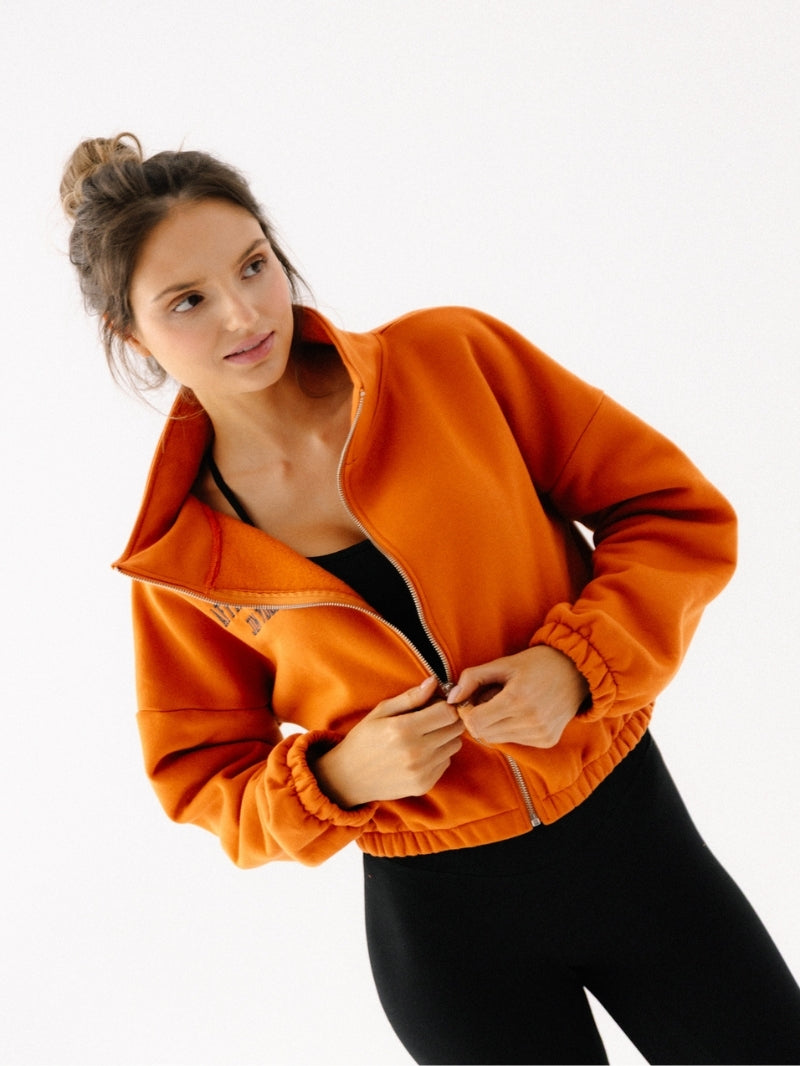 Damska rozpinana bluza ze stójką w pomarańczowym odcieniu z grafitowym haftem