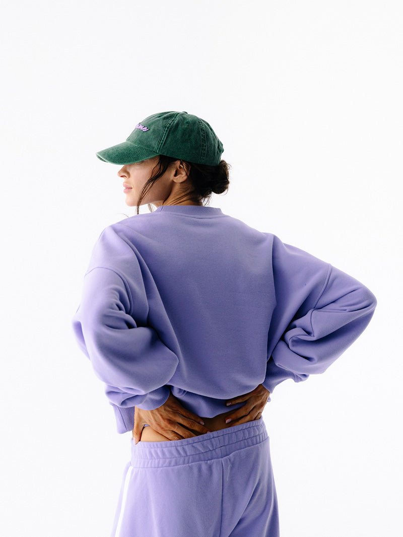 Zielona damska czapka z daszkiem Radiance - set z fioletowym pulloverem i spodniami bawełnianymi