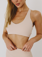 Kremowy stanik sportowy racerback