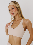 Kremowy stanik sportowy racerback Clean – JOYINME