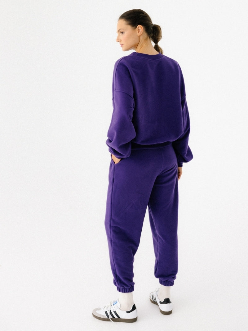 Fioletowa bawełniana bluza oversize - set z luźnymi spodniami w tym samym kolorze 